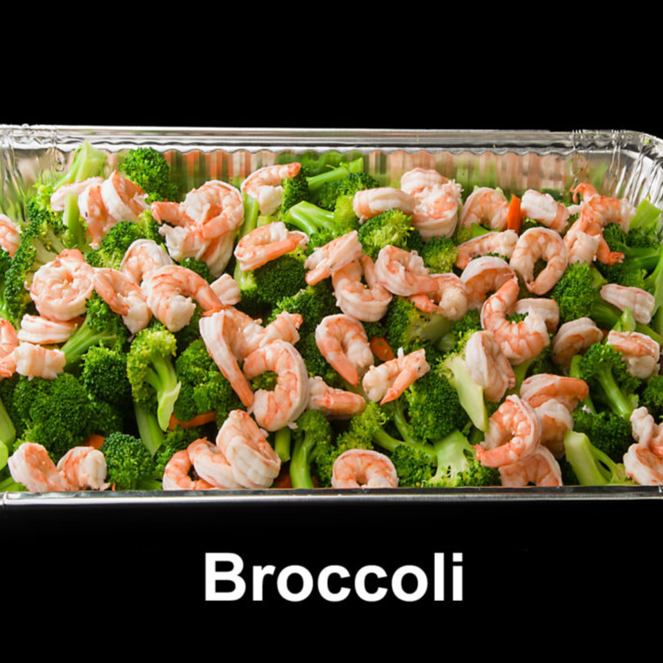 Shrimp and broccoli in a foil pan, ready for catering or takeout from Las Tres Casuelas.