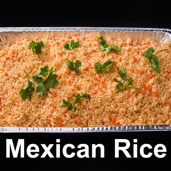 A large catering tray filled with Las Tres Casuelas' Mexican rice, garnished with cilantro and carrots.