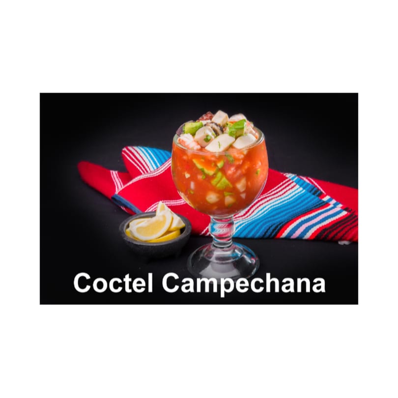 Coctel Campechana, a Tex-Mex seafood cocktail with shrimp, octopus, and avocado in a goblet.